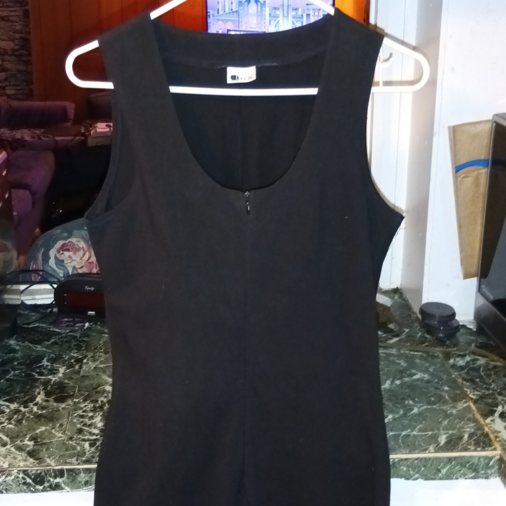 Black one piece jumpsuit size (Small.) Scoop Neck, Zippered Front.